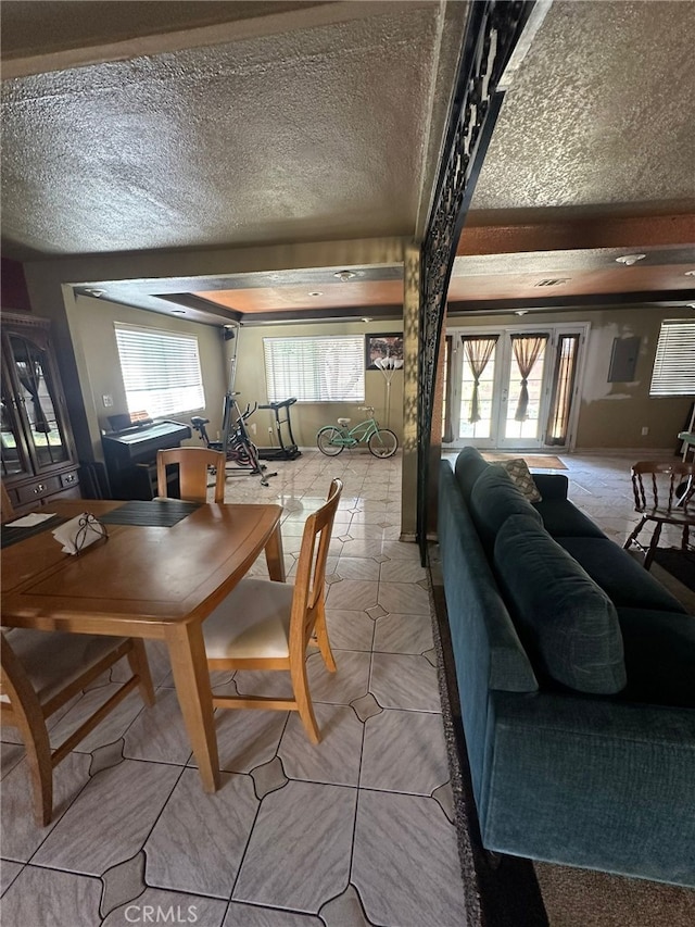 829 Foxworth Ave, La Puente, CA 91744 - dining room featuring a textured ceiling