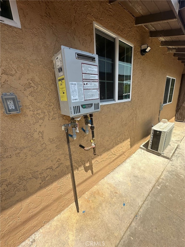 829 Foxworth Ave, La Puente, CA 91744 - exterior view of stucco siding and an ac unit