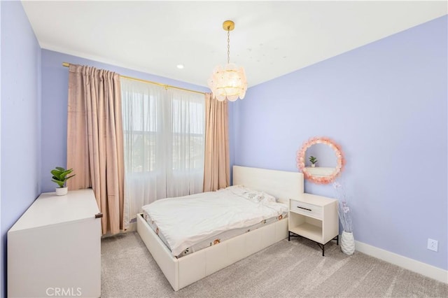 16526 Trailblazer Ave, Chino, CA 91708 - carpeted bedroom with a chandelier and baseboards