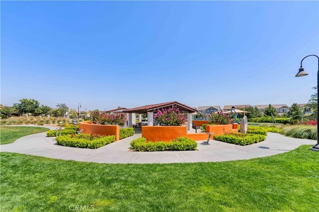 16526 Trailblazer Ave, Chino, CA 91708 - view of front of home with a gazebo and a front yard