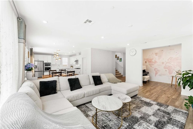 16526 Trailblazer Ave, Chino, CA 91708 - living room with light wood-style floors, stairs, and recessed lighting