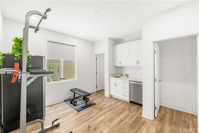 16526 Trailblazer Ave, Chino, CA 91708 - workout area featuring a sink and light wood-type flooring