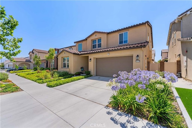 16526 Trailblazer Ave, Chino, CA 91708 - mediterranean / spanish home with stucco siding, a tile roof, a garage, and driveway