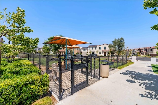 16526 Trailblazer Ave, Chino, CA 91708 - view of home's community featuring a residential view and a gate