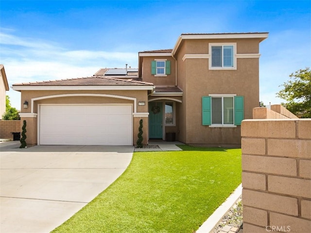 17995 Lacebark Ct, San Bernardino, CA 92407 - view of front facade with stucco siding, concrete driveway, solar panels, an attached garage, and a tile roof