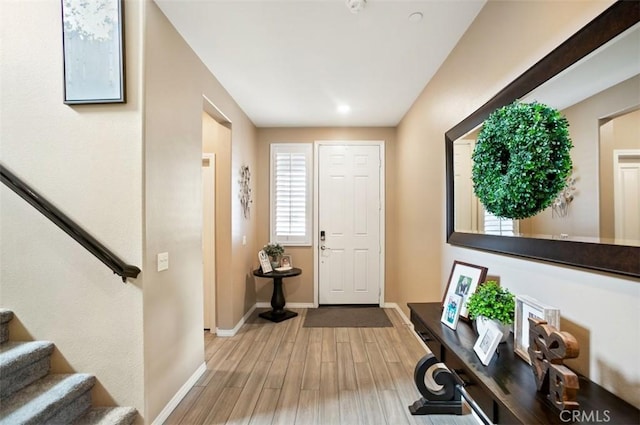 17995 Lacebark Ct, San Bernardino, CA 92407 - entryway featuring stairs and wood finished floors