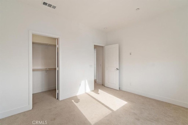 2750 182nd St Unit 112, Torrance, CA 90504 - unfurnished bedroom with carpet, a spacious closet, baseboards, and a closet