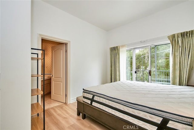 1089 Village Dr, Chino Hills, CA 91709 - bedroom featuring wood finished floors, access to exterior, and baseboards