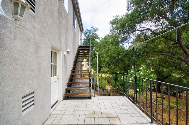 1089 Village Dr, Chino Hills, CA 91709 - view of patio with stairs and a balcony