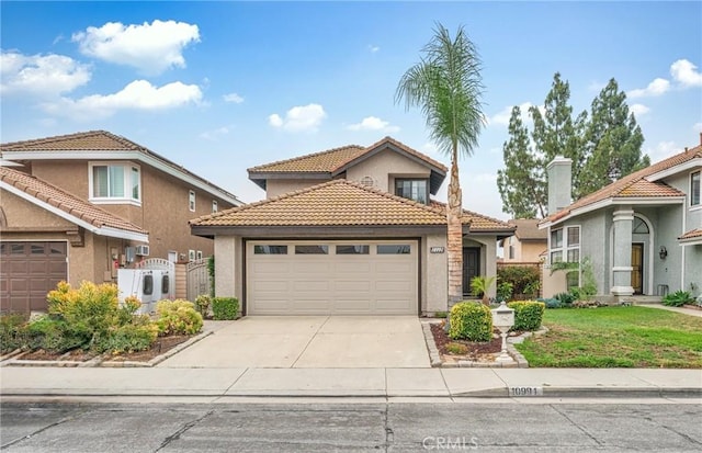 10991 Countryview Dr, Rancho Cucamonga, CA 91730 - view of front of property featuring stucco siding, concrete driveway, a garage, and a tile roof