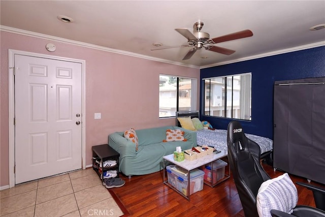 1313 Massachusetts Ave Unit 206, Riverside, CA 92507 - living area featuring a ceiling fan, crown molding, and tile patterned floors