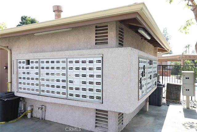 1313 Massachusetts Ave Unit 206, Riverside, CA 92507 - view of side of home featuring stucco siding and mail area
