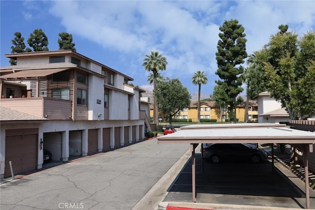 1313 Massachusetts Ave Unit 206, Riverside, CA 92507 - view of asphalt road with a residential view