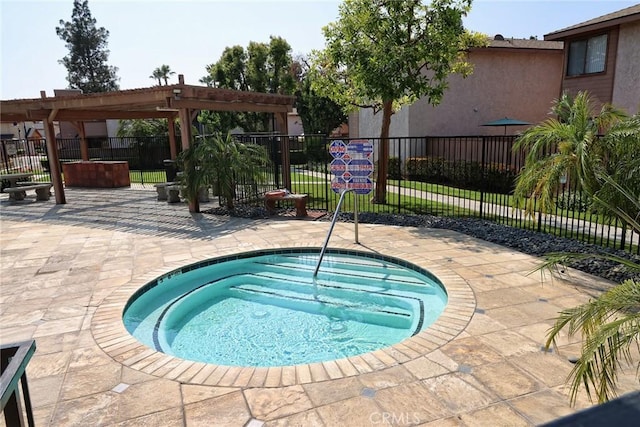 1313 Massachusetts Ave Unit 206, Riverside, CA 92507 - view of pool featuring a hot tub, a patio, and a pool