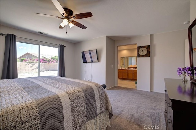 47734 Mirage Way, Indio, CA 92201 - carpeted bedroom featuring ceiling fan and connected bathroom