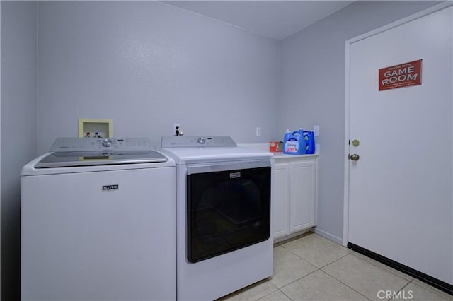47734 Mirage Way, Indio, CA 92201 - laundry room with washer and dryer, cabinet space, and light tile patterned floors