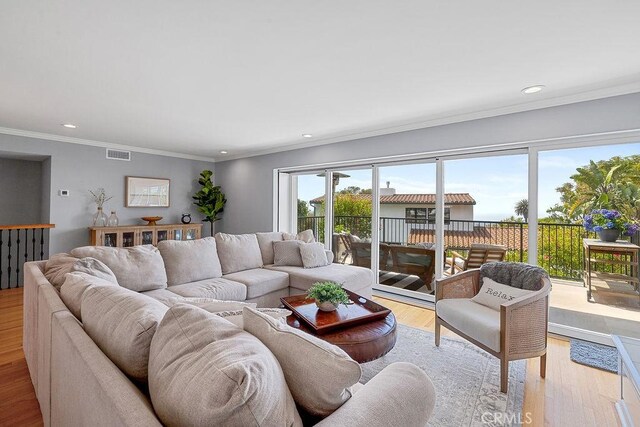 1609 Via Montemar, Palos Verdes Estates, CA 90274 - living area featuring light wood-style flooring, crown molding, and recessed lighting