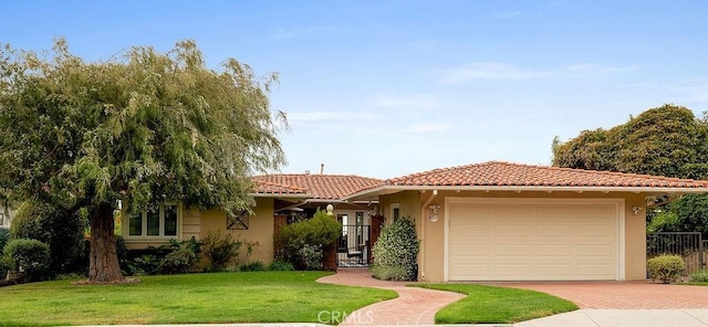 1609 Via Montemar, Palos Verdes Estates, CA 90274 - view of front of home featuring decorative driveway, a tile roof, an attached garage, and stucco siding