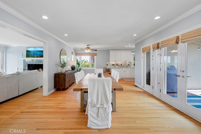 1609 Via Montemar, Palos Verdes Estates, CA 90274 - dining area with recessed lighting, light wood-style flooring, ceiling fan, ornamental molding, and a fireplace