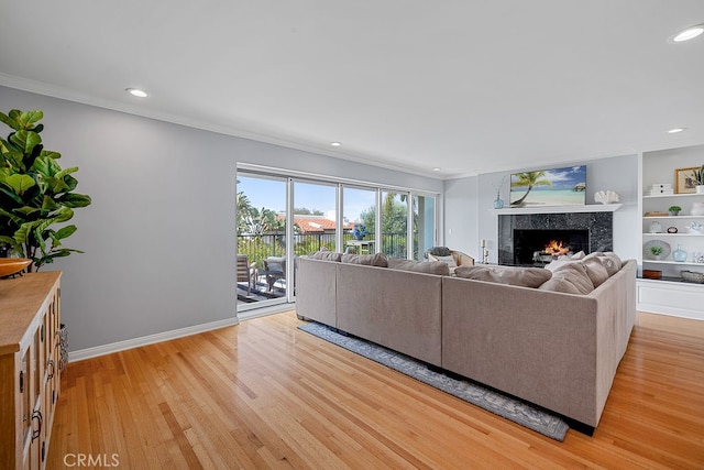 1609 Via Montemar, Palos Verdes Estates, CA 90274 - living area with a premium fireplace, light wood-style flooring, ornamental molding, and recessed lighting