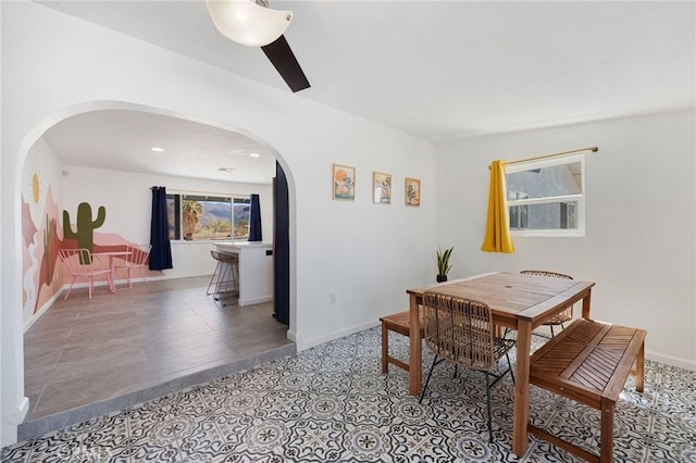 72726 Desert Trail Dr Unit 29, Palms, CA 92277 - dining room featuring arched walkways, baseboards, and tile patterned flooring