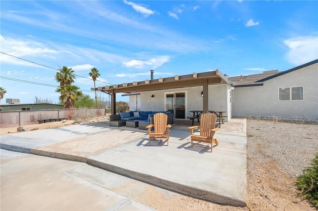 72726 Desert Trail Dr Unit 29, Palms, CA 92277 - back of property featuring an outdoor hangout area, a patio, and stucco siding