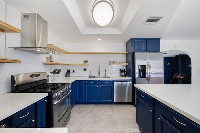 72726 Desert Trail Dr Unit 29, Palms, CA 92277 - kitchen with appliances with stainless steel finishes, island range hood, a sink, and open shelves