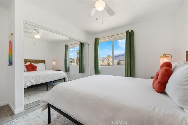 72726 Desert Trail Dr Unit 29, Palms, CA 92277 - tiled bedroom featuring ceiling fan and baseboards