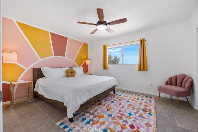 72726 Desert Trail Dr Unit 29, Palms, CA 92277 - tiled bedroom featuring baseboards and ceiling fan