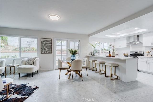 1717 Morning Sun Ave, Walnut, CA 91789 - dining area featuring a raised ceiling, recessed lighting, and light tile patterned floors