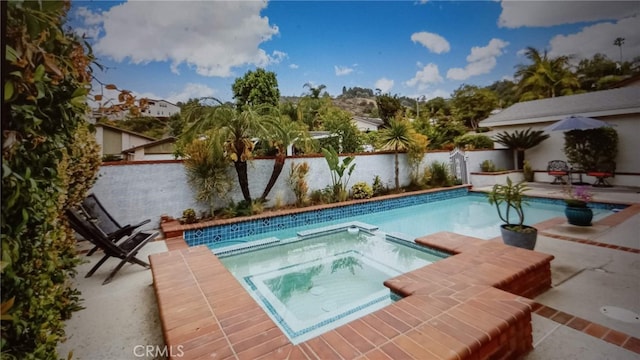 1717 Morning Sun Ave, Walnut, CA 91789 - view of pool with a fenced backyard, a pool with connected hot tub, and a patio