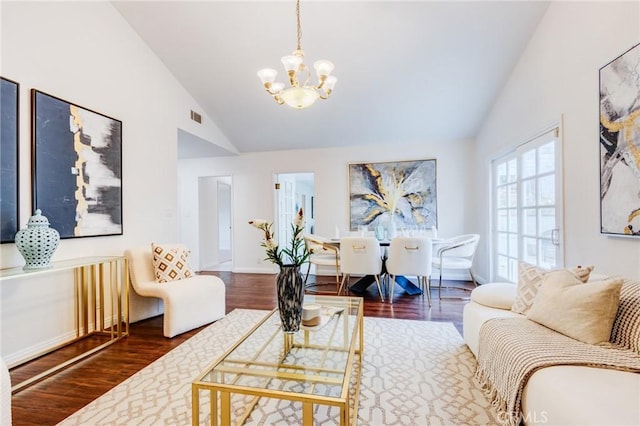 1717 Morning Sun Ave, Walnut, CA 91789 - living area with a chandelier, wood finished floors, and high vaulted ceiling