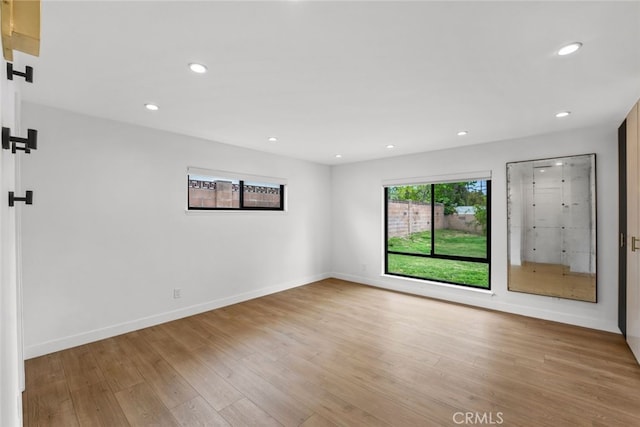 4801 Heaven Ave, Woodland Hills, CA 91364 - empty room featuring light wood-type flooring, baseboards, and recessed lighting