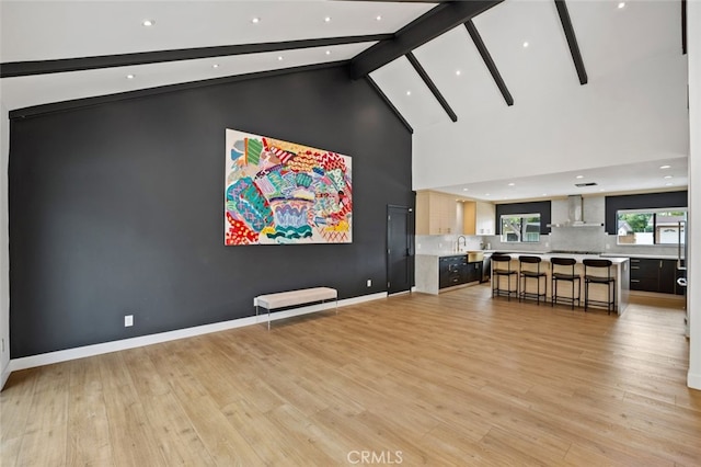 4801 Heaven Ave, Woodland Hills, CA 91364 - living room with high vaulted ceiling, beam ceiling, light wood-style floors, and recessed lighting