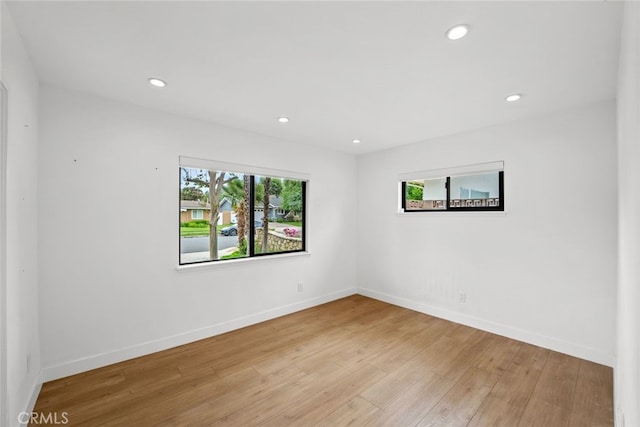 4801 Heaven Ave, Woodland Hills, CA 91364 - spare room with light wood finished floors, recessed lighting, and baseboards