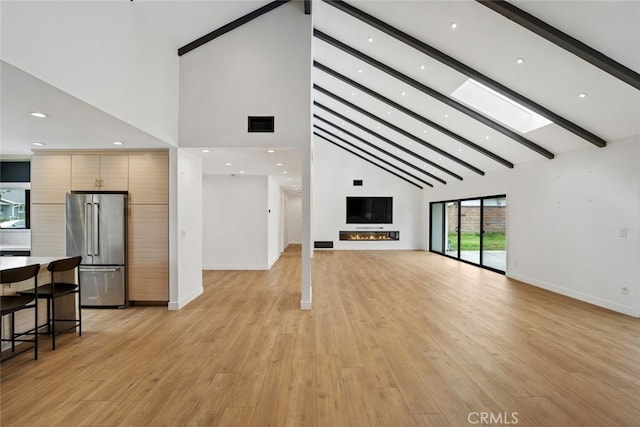 4801 Heaven Ave, Woodland Hills, CA 91364 - unfurnished living room with high vaulted ceiling, beamed ceiling, baseboards, light wood-style flooring, and recessed lighting