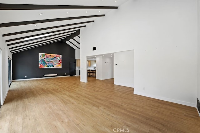 4801 Heaven Ave, Woodland Hills, CA 91364 - unfurnished living room with beamed ceiling, light wood finished floors, baseboards, high vaulted ceiling, and recessed lighting