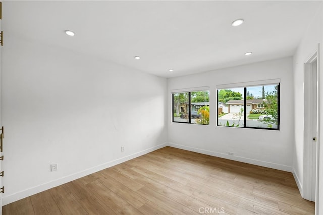 4801 Heaven Ave, Woodland Hills, CA 91364 - spare room with light wood-style floors, recessed lighting, and baseboards