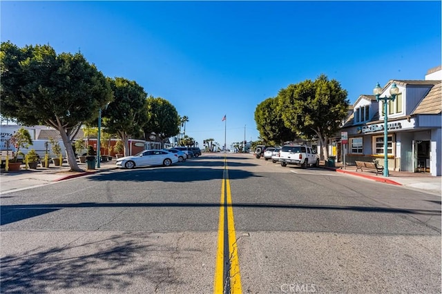 1207 Seal Way, Seal Beach, CA 90740 - view of asphalt street with sidewalks, curbs, and street lights