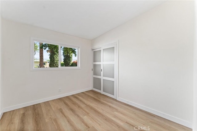 17924 E Kelby St, Covina, CA 91722 - empty room featuring light wood-style floors and baseboards