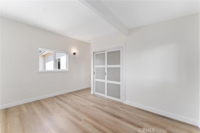 17924 E Kelby St, Covina, CA 91722 - spare room featuring light wood-type flooring and baseboards