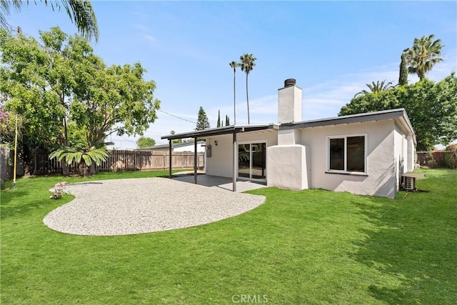17924 E Kelby St, Covina, CA 91722 - rear view of house with a patio area, a chimney, a fenced backyard, and stucco siding