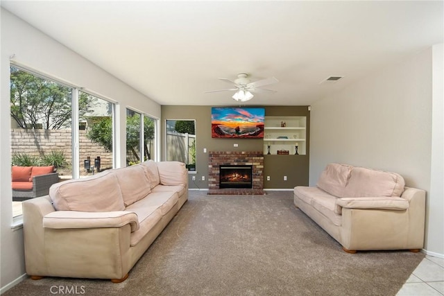 178 Grapevine Dr, Corona, CA 92882 - living room with a ceiling fan, a fireplace, and baseboards