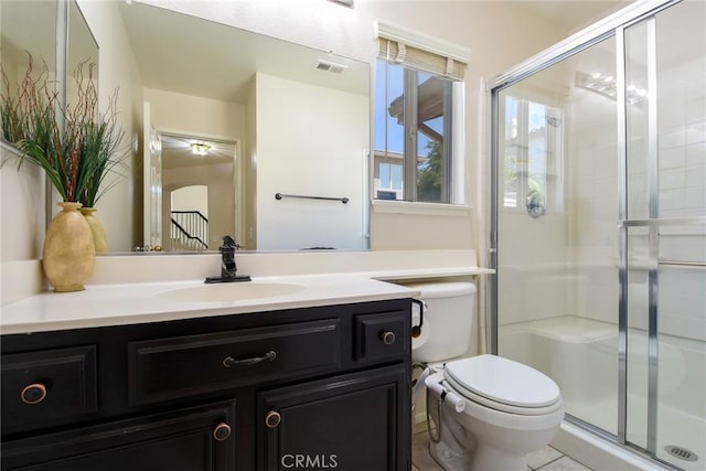 178 Grapevine Dr, Corona, CA 92882 - full bathroom featuring toilet, vanity, and a stall shower