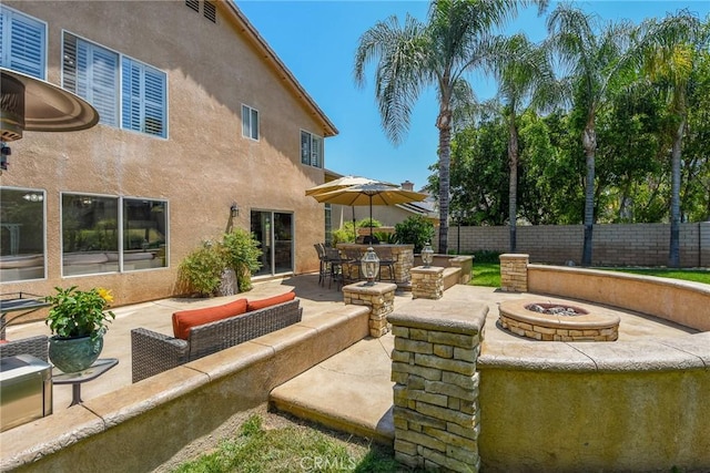 178 Grapevine Dr, Corona, CA 92882 - view of patio with an outdoor living space with a fire pit