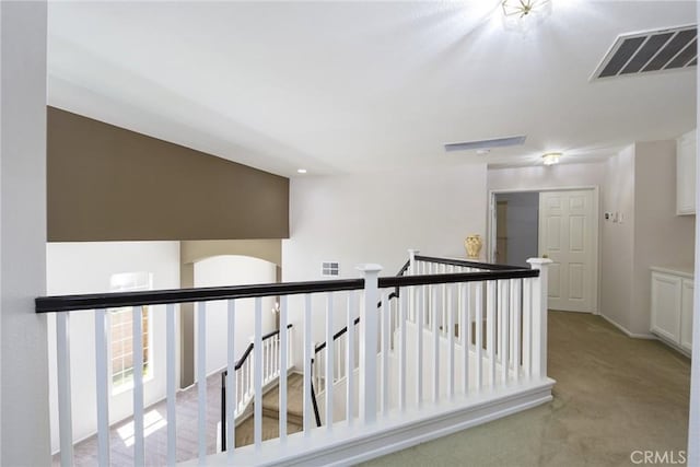 178 Grapevine Dr, Corona, CA 92882 - hallway with carpet floors and an upstairs landing