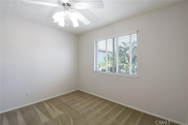 178 Grapevine Dr, Corona, CA 92882 - carpeted empty room with baseboards and a ceiling fan