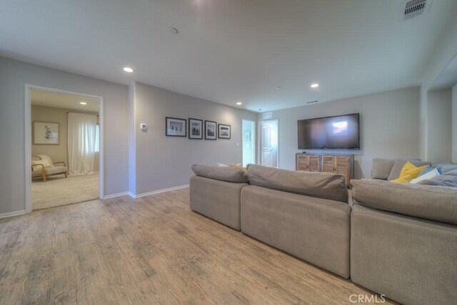 32593 Cumulus Ln, Winchester, CA 92596 - living room with wood finished floors, recessed lighting, and baseboards