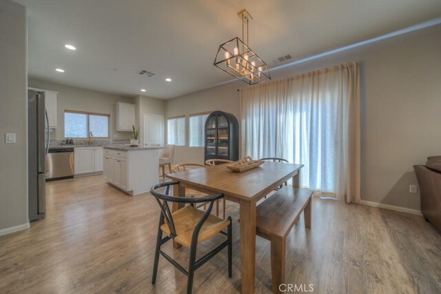 32593 Cumulus Ln, Winchester, CA 92596 - dining area with plenty of natural light, recessed lighting, light wood-style floors, and baseboards