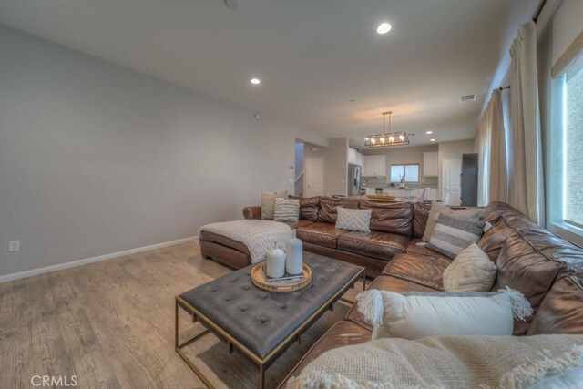 32593 Cumulus Ln, Winchester, CA 92596 - living room with a chandelier, plenty of natural light, light wood-style flooring, and recessed lighting
